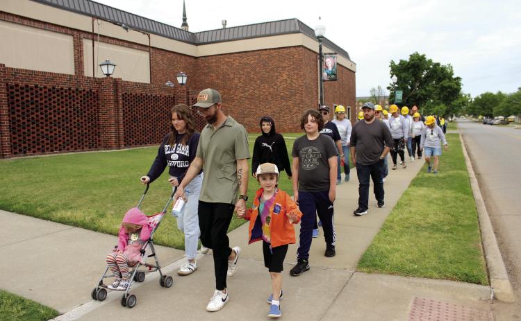 About 75 people participated in the United in Strength Stroll on April 19, recognizing the one-year anniversary of the 2023 tornado. Following a proclamation by Shawnee Mayor Ed Bolt and speeches from John Bobb-Semple, of POGO; Heath Thomas, of OBU; Dr. Aaron Espolt, of Shawnee Public Schools; and Sandy Vanderburg, of United Way of Pottawatomie County, they walked from OBU to the YMCA. Countywide & Sun/Natasha Dunagan