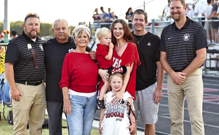 North Rock Creek celebrate Coach Gary Higgins being one of the 2024 Oklahoma Coaches Hall of Fame inductees. The ceremony was held during the annual OCA Coaches Clinic and All State week in July. Pictured from left are NRC Athletic Director Evan Smith; Higgins; wife, Sherry; Ezra, Sophia, Jessica and Eric Slaughter; and, NRC Superintendent Blake Moody. Photo courtesy of Gowin Photography.