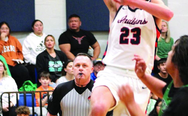 After stealing the ball, Asher’s Mikey Van-Schuyver goes for a layup and is fouled in the Jan. 2 home game with Varnum. File photo