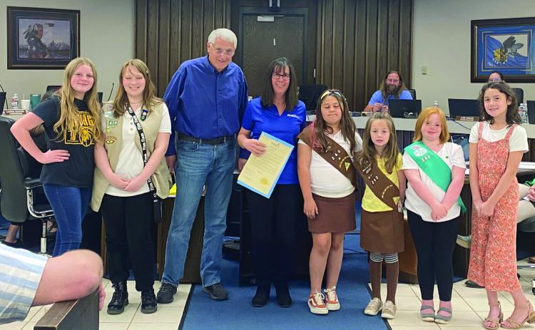 Girl Scout members were present at the Shawnee City Commission meeting Monday, Apr. 10 and were presented with the Arbor Day Proclamation presented by Shawnee Mayor Ed Bolt. Bolt said the troop was helpful in planting trees recently distributed in Shawnee. Pictured from left are Elana McPherson, Olivia Hill, Mayor Bolt, Leader Sue Ellen Frerichs, Harley Messinger, Reagan Yahola, Violet Mosier, and Ember McPherson. Countywide &amp; Sun/Suzie Campbell