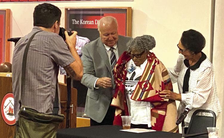 Citizen Potawatomi Nation Chairman John “Rocky” Barrett and Vice Chairman Linda Capps drape a blanket on the shoulders of the Grandmother of Juneteenth, Opal Lee. Chairman Barrett said, “The giving of a blanket carries more than just the giving of a gift. If you’re given a blanket, in Potawatomi tradition it means that we’re going to keep your memory warm in our hearts from now on.” Lee kept the blanket on throughout the rest of the event. Countywide & Sun/Suzie Campbell
