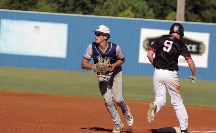 Asher sophomore Hudson Skender makes the catch at first base during the Sept. 26 Class B District game with Lookeba-Sickles. The Indians won that game, 12-0, as well as the game with Mc-Curtain, 18-0. On Sept. 27, the districts continued, and Asher beat Lookeba-Sickles again, 11-0. The Indians will face off with Mill Creek in regional play today (Oct. 3) at 4 pm in Boswell. If they win the second game at 6 pm, they will advance to the State Tournament. Countywide &amp; Sun/Natasha Dunagan