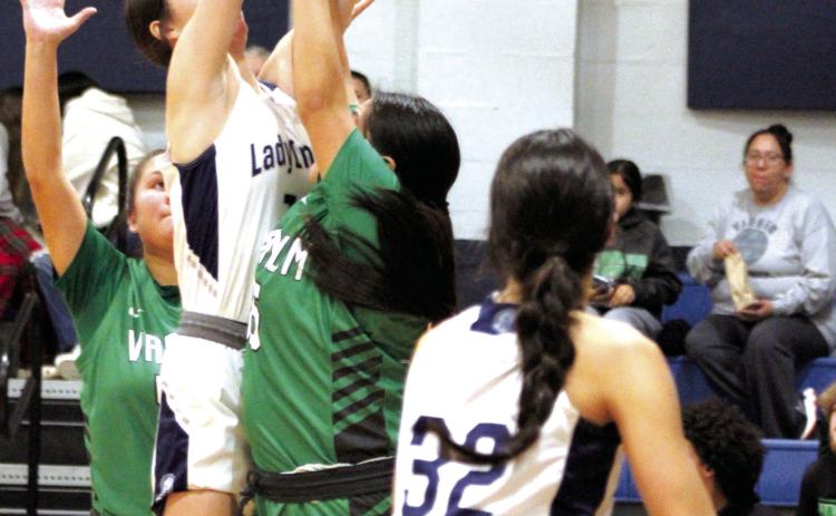 Asher’s Alexis Johnston tries for the bucket and draws a foul in the home game with Varnum on Jan. 2. The Lady Indians lost, 38-52.