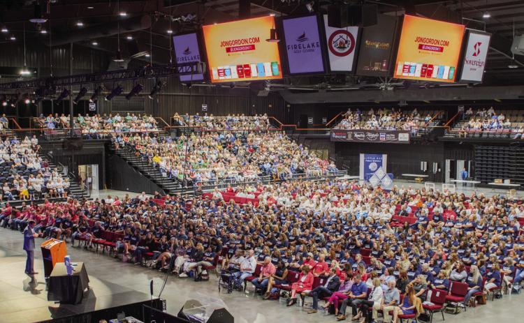 Jon Gordon addresses an audience of nearly 2,000 local educators at the “Celebrate Teachers” event on Monday, Aug. 7. Photo courtesy of Jesse Monday Media