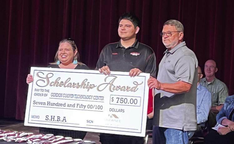 Kaden Deleonrodriguez, center, received the HVAC scholarship. Pictured with Deleonrodriguez is the Shawnee Home Builders Association (SHBA) board member April Grant (left) and SHBA president Greg Sebastian (right). Photo provided by Shawnee Forward