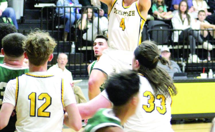 Tecumseh’s Brady Overstreet makes a jump shot during the home game against Seminole on Jan. 28. The Savages lost, 51-54. Countywide &amp; Sun/Natasha Dunagan