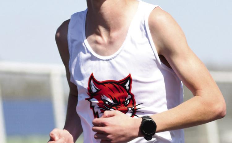 (right) EHS's Konnor Arington placed 5th in the 3200 meter run with a time of 1:11.72 in the Stroud track meet on Mar. 28.