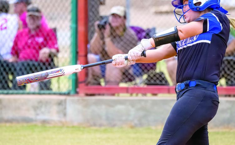 Bethel’s Payton Epperley takes her turn at bat in the game against Elk City during the Ivan E. Schultz Memorial Fastpitch Tournament in Prague. The Lady Wildcats came out champions at the tourney on Aug. 20. Photo provided by Richelle Treece.