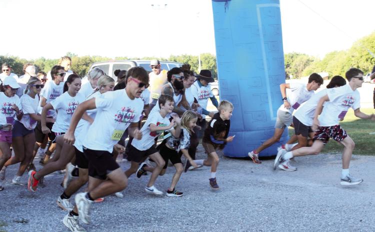 Participants in the Fourth Annual House of Hope (HOH) Color Fun Run take off from the starting line at the Citizen Potawatomi Nation Festival Grounds on Oct. 11. HOH Prevention Specialist Kayla Woody said there were 547 people who signed up online. Full caption below. Photos by Natasha Dunagan, Countywide & Sun