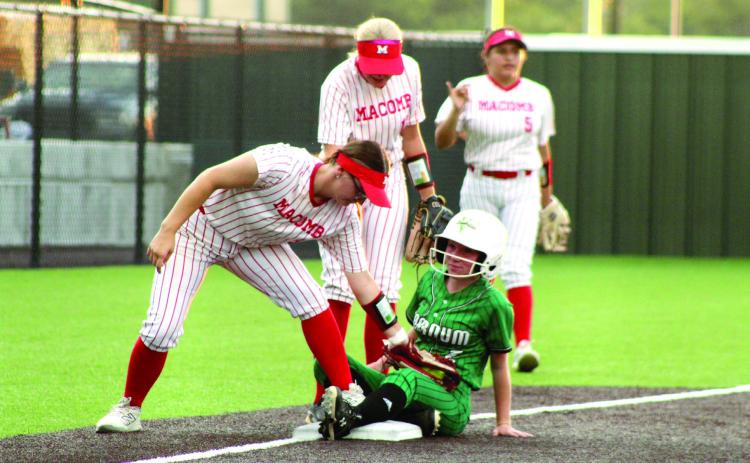 Macomb senior Deja Givens tags a Varnum runner, who was controversially declared safe, at third base during the Little River Conference Tournament game at FireLake Ball Fields on Sept. 10. Macomb lost in overtime, 2-3. The Lady Hornets lost three games and won one - against Maud-Sasakwa, 16-4 - in the three-day tournament. Photos by Natasha Dunagan, Countywide & Sun