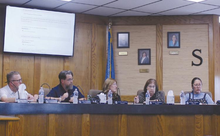 Dr. Jason James, Shawnee Superintendent, far right, wraps up his report to the Shawnee Public Schools Board of Education at their regular meeting on Aug. 4. Shown, from left, are Turner Bass, Russ Oliver, President Clif Harden, Jeanne Swinney, Mandy Hillhouse and Kristen Wilson. The Board meets on the first Monday of each month (except in July). Natasha Dunagan, Countywide & Sun