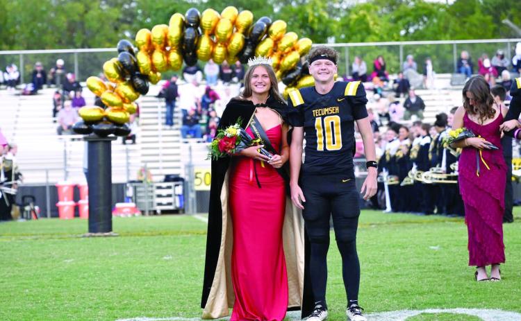 Tecumseh High School Homecoming Queen Maddie Gray is escorted by senior Wyatt Dodgion during the ceremony on Oct. 2. Photos courtesy of Kenetta Lisenbee