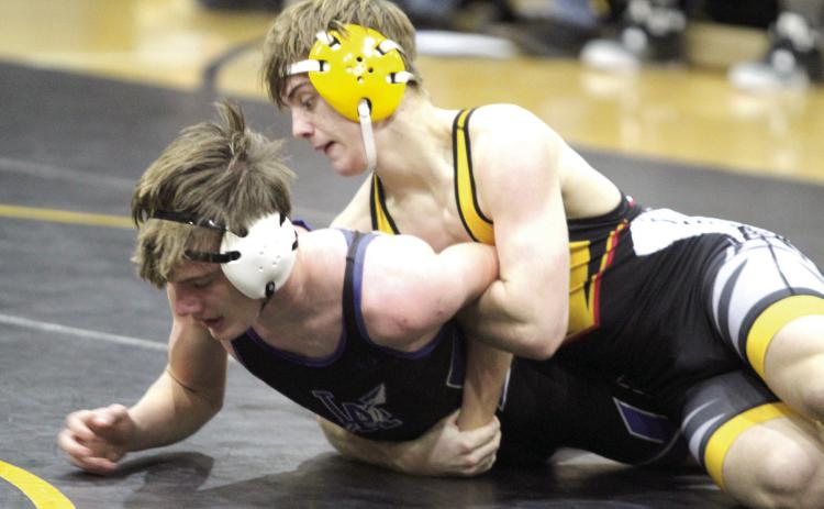In the 138 weight class, Tecumseh’s Tyler Bryant, top, tries to flip his Little Axe opponent during the Dec. 3 home dual. Little Axe won the season opener, 51-30., but the Savages beat Bethel on Dec. 5, 53-21. The Lady Savage wrestlers will face Harrah today (Dec. 12) at the Alumni Center, beginning with junior high girls and boys at 6 pm. Then, on Dec. 17 at the Alumni Center, the Savages and Lady Savages will square off against Chandler. Countywide &amp; Sun/Natasha Dunagan