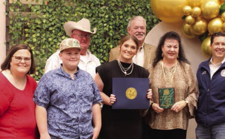 Dale graduate and OSU freshman Poppy Robinson received the 4-H Outstanding Senior Award and a Citation of Congratulations from Oklahoma Senator Shane Jett during the Pottawatomie County 4-H Awards Banquet, held at the Heart of Oklahoma Expo Center on Oct. 27. Shown, from left, are mother Allison Robinson, brother Hardy Robinson, father Rod Robinson, P. Robinson, Randy Gilbert, Suzanne Gilbert and Jett. Natasha Dunagan, Countywide &amp; Sun