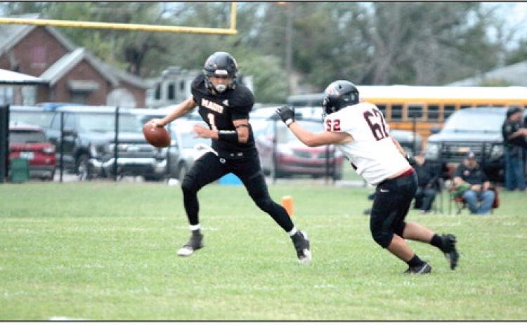 Maud sophomore Trenton Marshall sidesteps an Alex player as he shields the ball during the season-opening home game on Sept. 5. The Tigers lost, 6-52. Natasha Dunagan, Countywide &amp; Sun