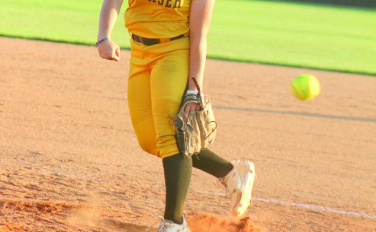 Natasha Dunagan, Countywide & Sun Pictured right, Tecumseh junior Embrie Smith hurls it home during the Class 4A Regional Tournament game against Skiatook, on Oct. 1.