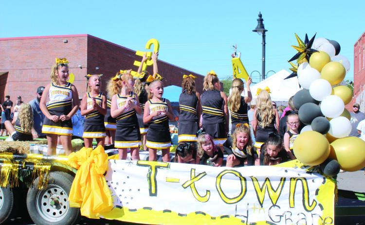 Tecumseh fourth-grade cheerleaders give the "SAVAGES" cheer as they ride in the Frontier Days Parade in 2025. This year, the parade has a red, white and blue theme for the 50th anniversary of the festival and 135th Tecumseh birthday and will start at 10 am. The Absentee Shawnee tribe will have a traditional dance at 9 am, with Miss Frontier Days being crowned at 9:30 am. File photo