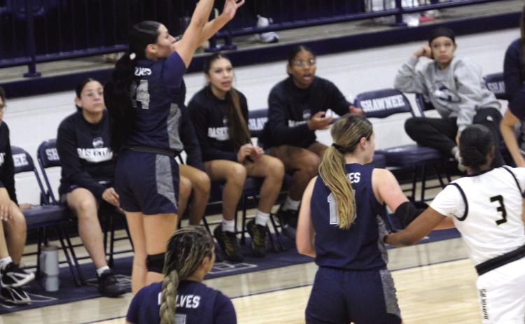 With 10 seconds left in the game, Shawnee senior Daley Rice launches a trey and sinks it in the Jan. 22 game against Midwest City during the Shawnee Invitational. The Lady Wolves lost this hard-fought game 50-54. The day before, they won with Harding Charter 55-19. Natasha Dunagan, Countywide &amp; Sun