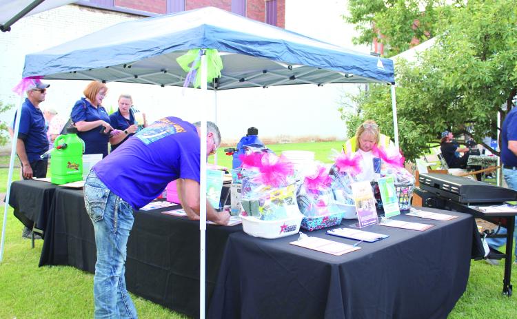 Rose Rock Habitat for Humanity offered a silent auction as part of their Hope on the Horizon Benefit Concert, held at Main and Broadway streets in Shawnee on July 21. There was a street fair which featured inflatables, food trucks, 12 vendors, four bands who played outside, and a VIP concert inside at the Ritz featured three musical acts and a comedian.
