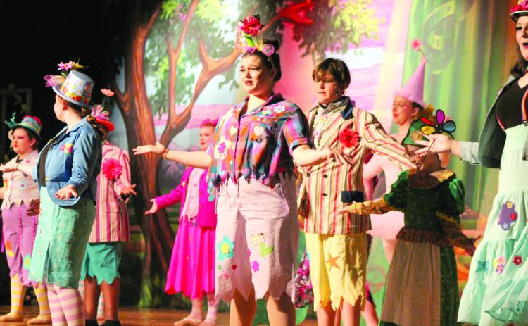 The Munchkins fill the stage in colorful costumes to sing and dance during the Tecumseh Middle School and High School production of "The Wizard of Oz" on April 28. The Munchkins were played by Addison Arnold, Levi Carter, Lydia Clagg (center), Dani Clark, Ramona Griffin, Reegan Kirby, Lilly Klutts, Camryn Medley, Ethan Quinn, Serenity Shackleford and Abigail Weeks (not in order). They gave three performances for all the Tecumseh students and two for the public.