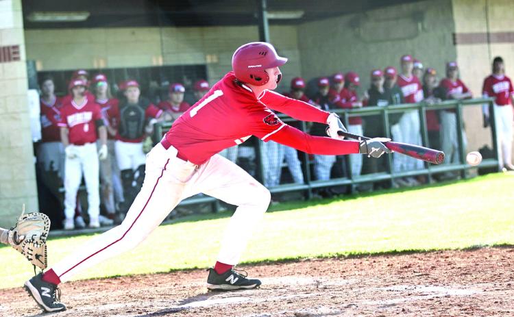 North Rock Creek’s Gus Snodgrass lays down a bunt in the game against Perkins, Monday, Mar. 27. Photo courtesy of Gowin Phonotography