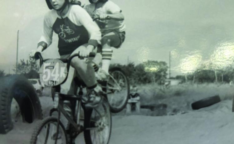 Cindy (Cooper) Parsons, far left, and her brother Rodney Cooper compete in BMX racing at one of the two tracks in Shawnee in the late 1970s. Parsons and Cooper will be inducted into the Oklahoma BMX Hall of Fame on Oct. 12. Photo provided