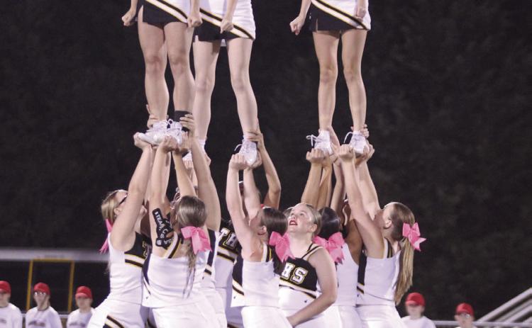 The Tecumseh High School cheerleaders form a pyramid during halftime of the Oct. 10 home game with Blanchard. Countywide & Sun/Natasha Dunagan