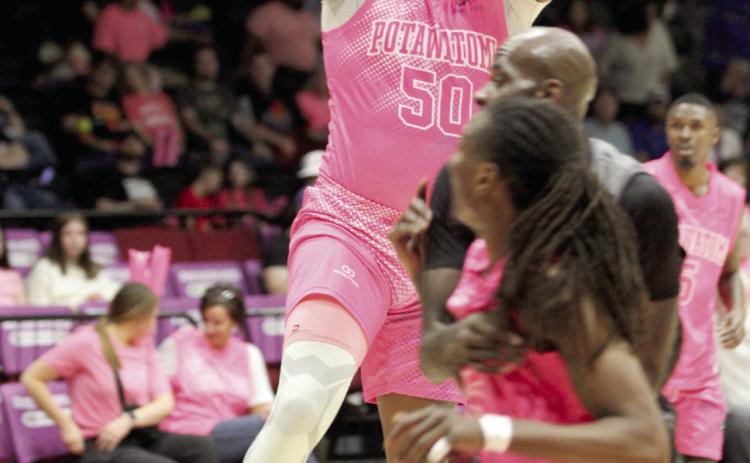 Potawatomi Fire Forward/Center Paul Harrison aims and adds two points to the board during the April 10 Pink Out home game against the Enid Outlaws. The Fire won, 127-113. Natasha Dunagan, Countywide & Sun