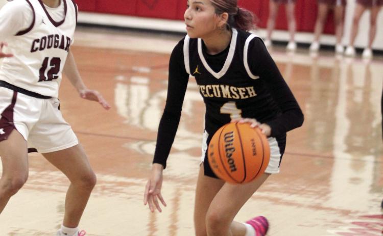 Tecumseh junior Livia FourHorns looks for an opening to pass in the fourth quarter of the Class 4A Regional Consolation Bracket game against Ada, held at McLoud on Feb. 26. The Lady Savages lost, 32-42, ending their season. Photos by Natasha Dunagan, Countywide & Sun