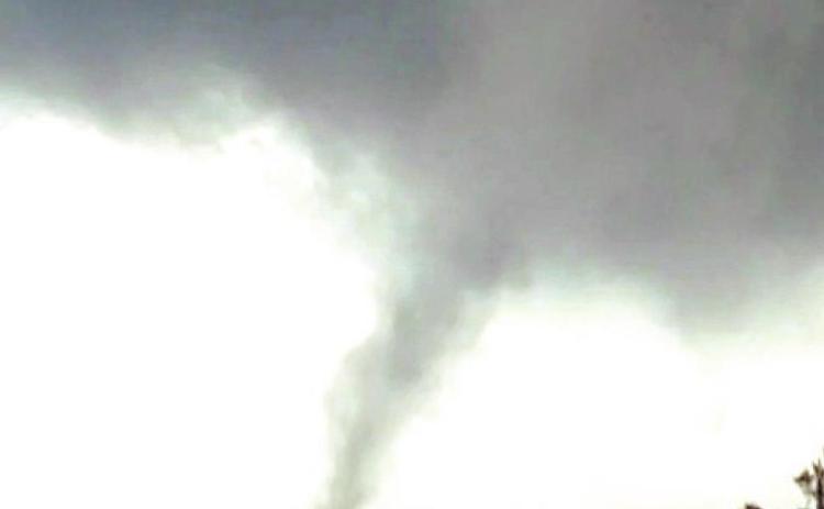 The May 4 tornado in Maud cuts across a field near the District 3 County Barn in Maud. Photo by Jeremiah Fletcher