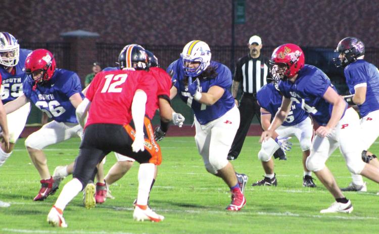 Bethel graduate Dominick Contreras (#77), on the South Team, blocks a North Team player during the Second Annual Citizen Potawatomi Nation All-Star Bowl, held at OBU on June 3. Michael Parsons, also of Bethel, played on the South Team, as well, and they won 26-6. Countywide &amp; Sun/Natasha Dunagan