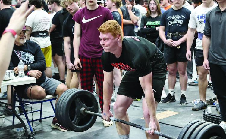 North Rock Creek’s Blain Robinson third in the 198 class during Regionals last week. NRC had 6 lifters qualify for State, which will be held Friday at El Reno. The team finished second overall in large schools. Photo courtesy of Gowin Photography