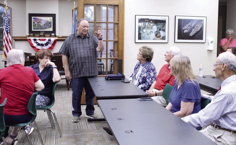 Retired Brigadier General Ben Robinson spoke to members of the Shawnee Veterans Memorial Committee (SVMC) and the public at the Pottawatomie County Veterans Educational Museum on June 11. Robinson was the commander of the 552nd Air Control Wing, based at Tinker AFB, during the attacks on Sept. 11, 2001, and he recounted the day-by-day progression of events during that time, using a slide show. See full caption below. Photos by Natasha Dunagan, Countywide & Sun