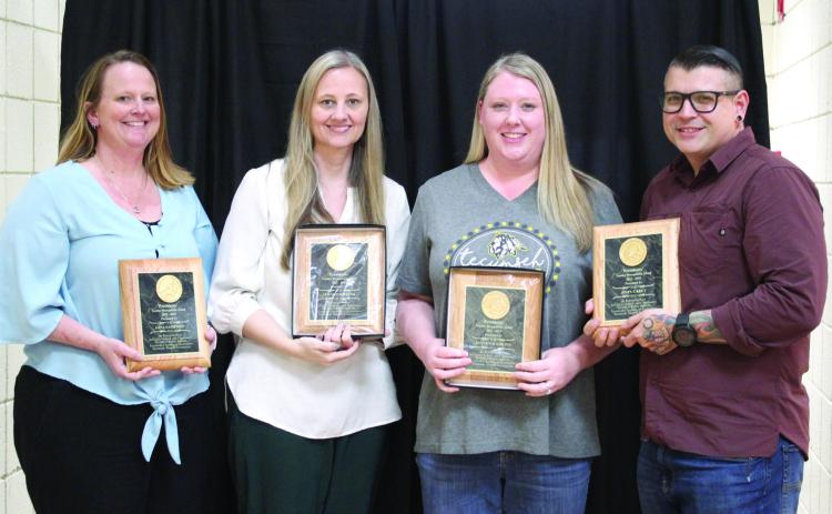 Gina Sampson, Jennifer Wiens, Jennifer Adkins and John Carey received the Presidents’ Teacher Recognition Award for this year. They were honored during the Tecumseh Chamber of Commerce Teacher’s Luncheon at City Hall on April 13. Countywide & Sun/Natasha Dunagan