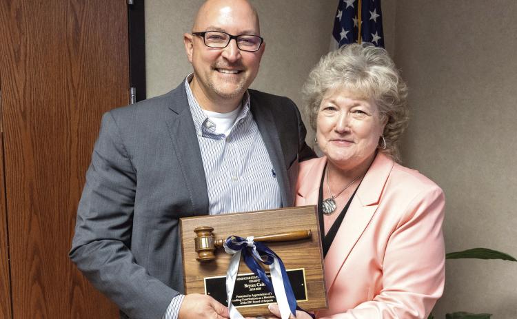 SSC Board of Regents member Bryan Cain (left) was recognized for his service to the College at the meeting on June 9. Following the meeting, President Lana Reynolds (right) presented him with a plaque and gavel, commemorating his time at the College. Photo provided by SSC