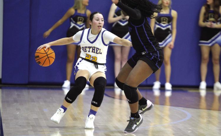 Bethel junior Ava Gascon guards the ball as she makes her way up court during the Jan. 7 home game against Mount St. Mary. The Lady Wildcats won, 58-41, and the Wildcats lost, 39-68, later that night. File photo