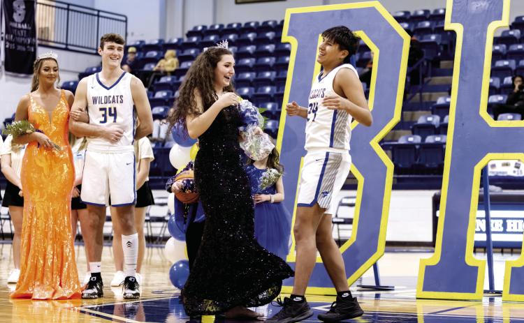 Bethel held homecoming coronation Friday, Jan. 27 at the Shawnee High School PAAC. Hannah Davidson and Si Foreman perform a little celebratory dance after Davidson was crowned as Queen. Photo provided by Richelle Treece.