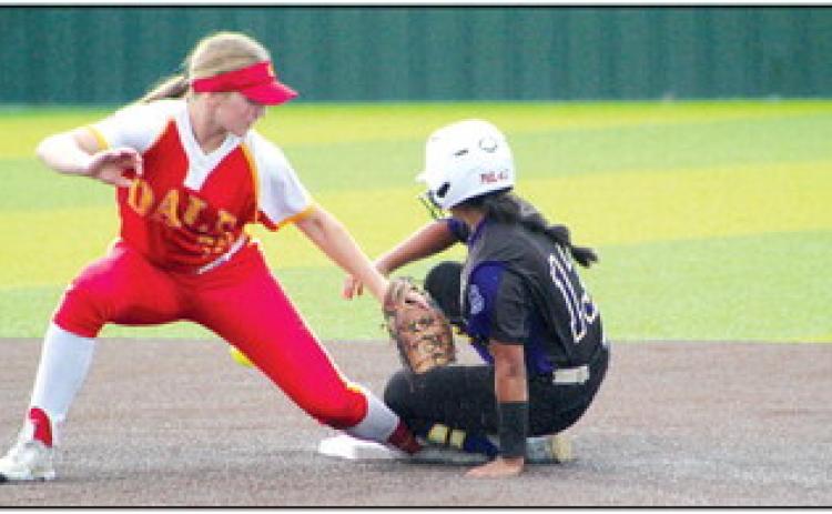 Dale’s Teague Muncy tries to tag a Red Oak runner that has slid onto her foot, but the ball has escaped her glove, during the Dale Festival at FireLake Ball Fields on Sept. 15.