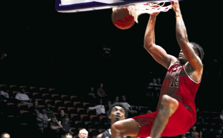 Potawatomi Fire Forward/Center T.J. Maston makes a slam dunk during the second game of first-round playoffs against the Enid Outlaws on June 3. Held at FireLake Arena, the game was won by the Fire, 101-86. The semifinals/second-round playoffs will begin today (June 8) at Wichita or Shreveport, according to potawatomifire.com. Countywide &amp; Sun/Natasha Dunagan