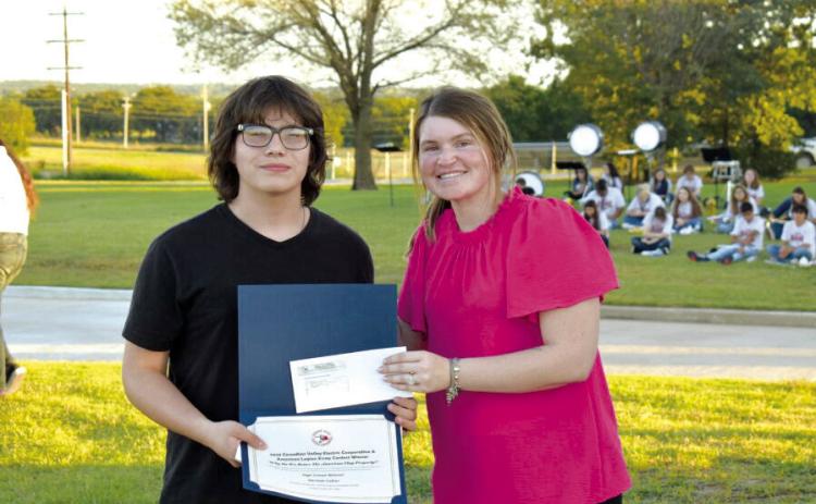 South Rock Creek student, Tatum Williams was awarded and presented with a $250.00 scholarship as the winner of the middle school division of the 2023 Canadian Valley Electric Cooperative essay contest. Local students were challenged to explore the theme of “Why do we retire the American flag properly?”. Photo provided