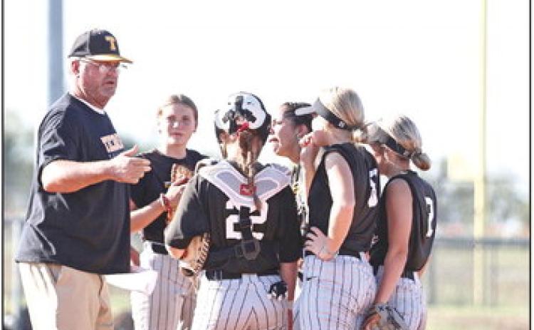 Tecumseh coach Chad Trahan talks strategy with the team. Photo courtesy of Gowin Photography