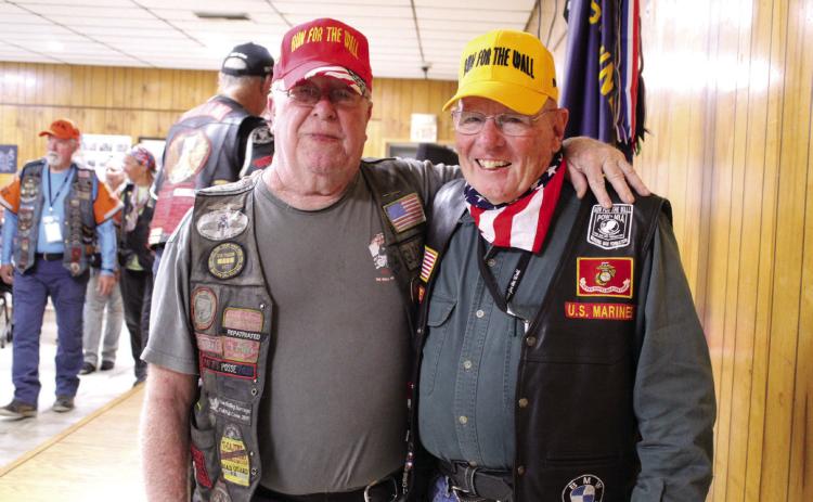 Run for the Wall Founder James "Gunny" Gregory, left, poses with the 12th Sergeant Major of the Marines, Gene Overstreet, during the Run for the Wall food stop at Shawnee VFW Post 1317 on May 16. This is the 36th official year for the cross-country ride, and more than 200 veterans participated on the Midway Route. Photos by Natasha Dunagan, Countywide & Sun