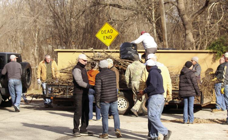 Volunteers spend the holiday working in Dunbar heights. Photo provided