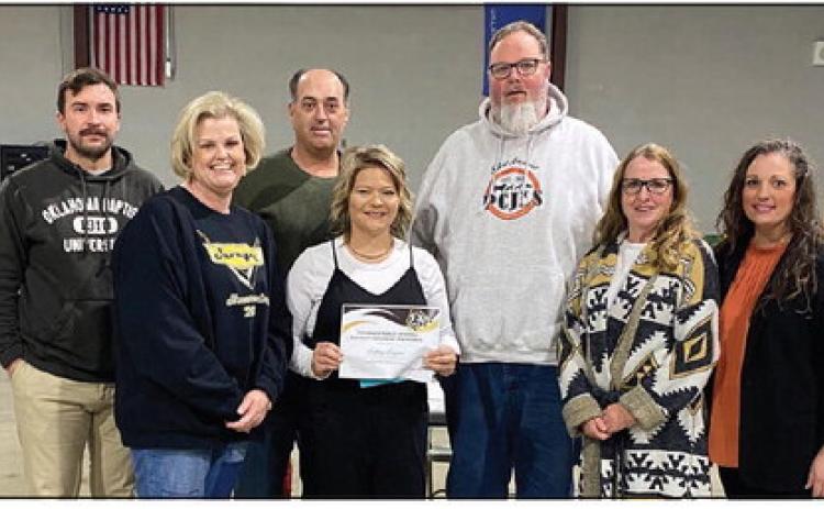 Tecumseh Alumni, Brittany Burgess, was recognized as Support Employee of the month at this month’s Tecumseh School Board meeting. Pictured from left to right: Board Member, Dylan Hays; Barnard Principal, Karla Buchanan; Board Member, Todd Kennedy; Barnard ParaProfessional, Brittany Burgess; Board Member, Tim Underwood; Board Member, Iva Bingham and Board Member, Nichole Sanchez. Countywide &amp; Sun/Julie Talton