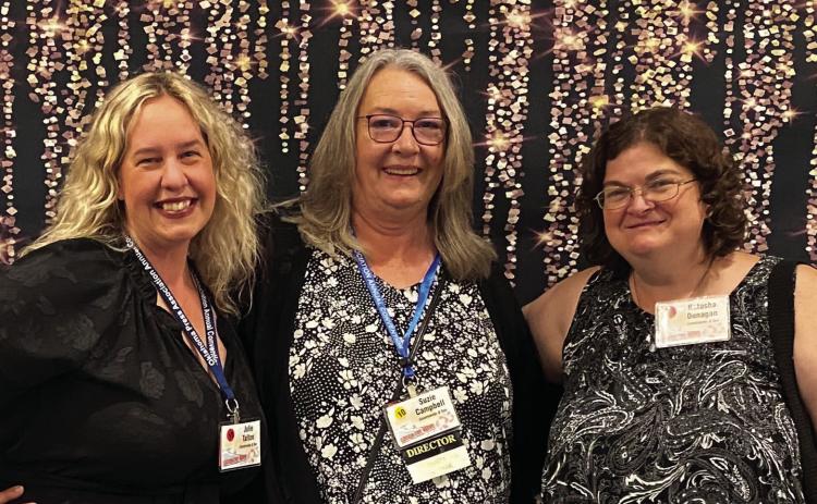 Julie Talton, Suzie Campbell and Natasha Dunagan step on the other side of the camera to celebrate their wins at the OPA Convention on June 8.