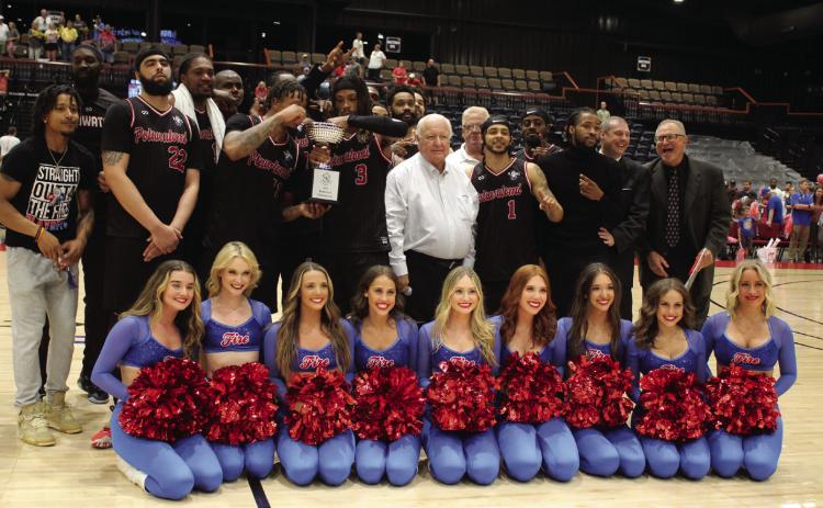 The Potawatomi Fire pose with the Fire Girls, Citizen Potawatomi Nation Chairman John "Rocky" Barrett, center, FireLake Arena Manager David Qualls, Head Coach Mark Danhoff and Assistant Coach Brad Walck after winning The Basketball League Central Conference Regionals on June 19. Countywide & Sun/Natasha Dunagan