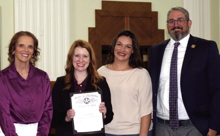 Kim Whitten, KC Campbell and District Attorney Adam Panter pose with Assistant District Attorney Lori McConnell who won the Prosecutor of the Year Award at the annual Domestic Violence Awareness &amp; Awards Julie Talton, Countywide &amp; Sun
