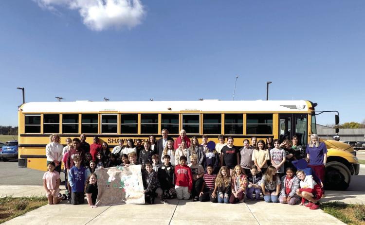 SMS 6th grade students pose for a group photo after participating in an interactive session where students explored what they envision for Shawnee’s future and examined areas of concern within their neighborhoods. Photo provided by Shawnee Public Schools.