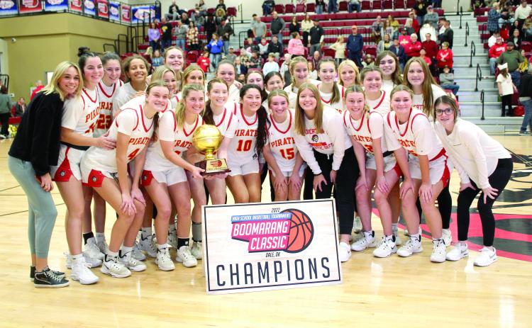 The Dale Lady Pirates pose after winning the girls bracket of the Dale Boomarang Classic on Dec. 10. The tournament was held at Dale, Dec. 8-10, and the Lady Pirates won all three of their games: Santa Fe South, 72-7; Millwood, 57-46; and Elgin, 47-26. Countywide &amp; Sun/Natasha Dunagan