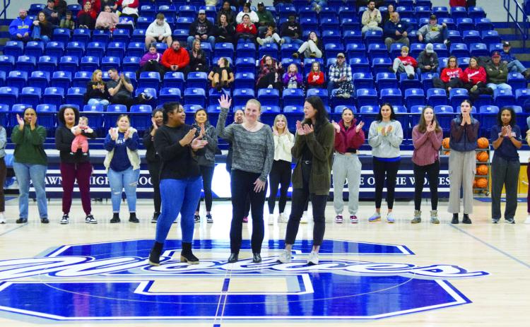 Current Lady Wolves Coach, Wendi Wells defies the norm and gets inducted into the SHS Hall of Fame while still coaching her girls. Coach Wells came to Shawnee 16 Seasons ago. In 2012, she led the Lady Wolves to a State Championship Victory and impressive 29-0 record. Several former players came home to support her induction during the half time festivities on Jan. 26. Countywide & Sun/Julie Talton